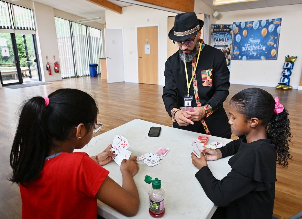 Children playing cards at the Father’s Day Family Social