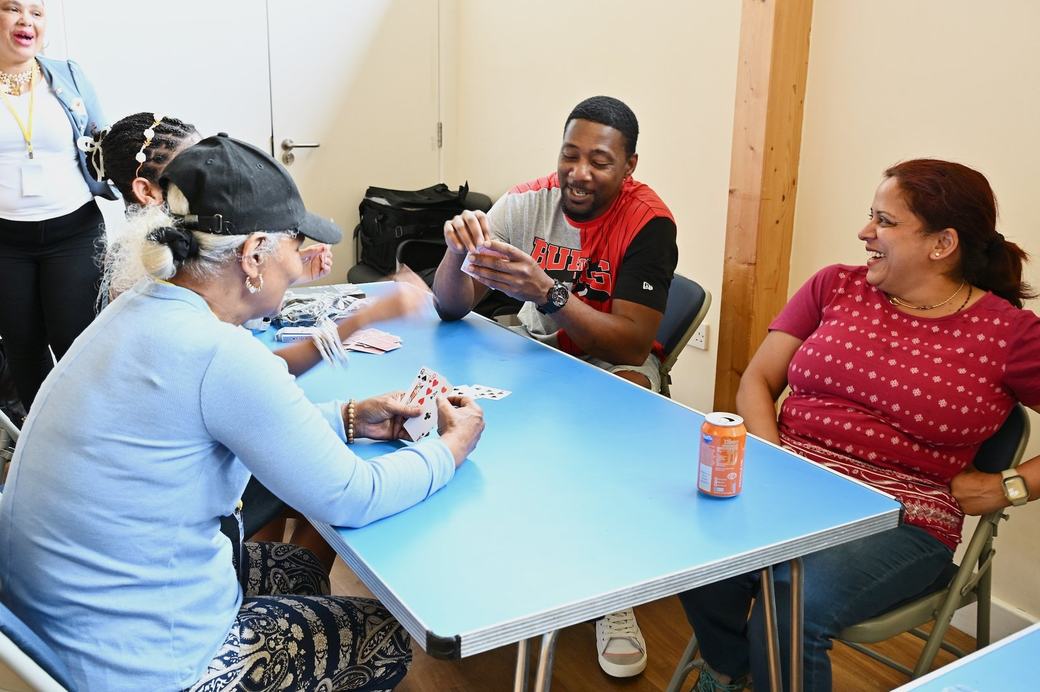 Families taking part in cards and table activities at the Father’s Day Family Social 2026