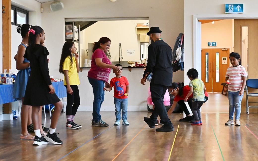 Children preparing for an indoor game activity