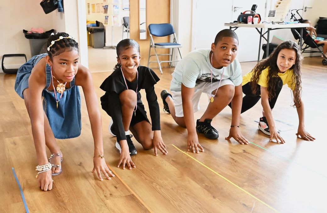 Children preparing to race during the indoor family games